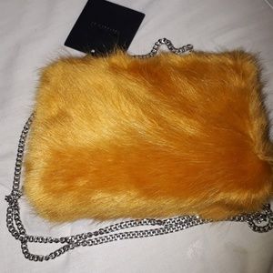 Orange fur clutch w/ chain shoulder strap